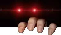 a close up of a person 's fingers with red lights behind it