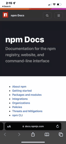 a phone screen shows the npm docs page