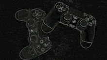 a pair of playstation 4 controllers on a black surface .