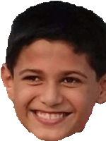 a young boy is smiling and looking at the camera .