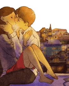 a man and a woman are kissing while sitting on the ground in front of a city .