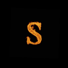 the letter s is made of fire and is on a black background .