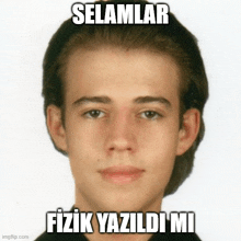 a close up of a young man 's face with the words selamlar written above him