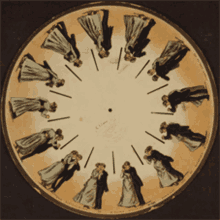 a clock face with a few people dancing around it