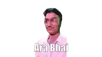 a man wearing glasses and a pink shirt with the words `` ara bhai '' written on his face .