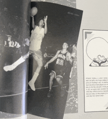 a black and white photo of basketball players with one wearing a bulls 22 jersey