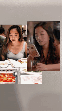 a woman sitting at a table looking at her phone and a woman sitting at a table looking at her phone