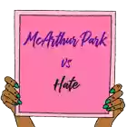 a pink sign says mcarthur park vs hate