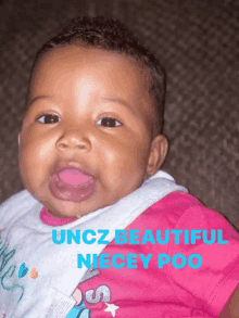 a baby wearing a bib with the words " uncz beautiful niecy poo " on the bottom