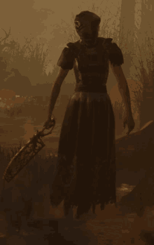 a woman in a black dress is holding a sword in a dark forest