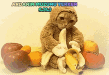 a picture of a cat holding a banana with the words ardanin muzunu yerken sjsj