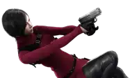 a woman in a red sweater is laying down holding a gun