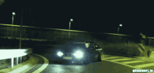 a gif of a car driving down a highway has the url gifmemes.io