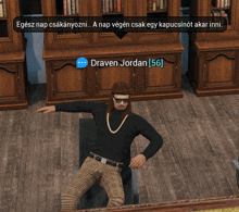 a man in a black shirt and plaid pants sits in a chair with a message from draven jordan