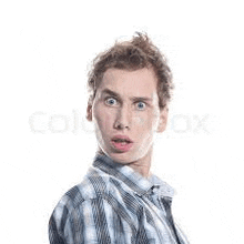 stock image of a young man making a surprised face .