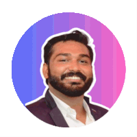 a man with a beard is smiling in a circle with a purple and pink background