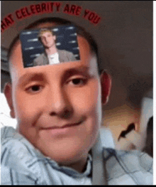 a man with a picture of a man on his forehead .