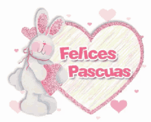 a bunny holding a pink heart with the words felices pascuas written on it