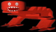 a red toy with a face and teeth is standing on a black background