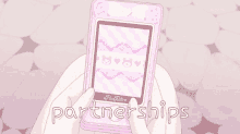 a person holding a pink phone that says partnerships on the bottom