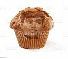 a muffin with a picture of a man 's face on it royalty - free