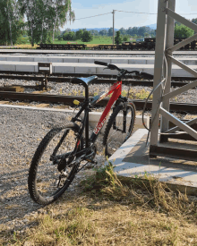 a red and black bicycle with the word voltex on the front