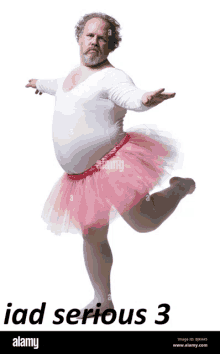 a man is wearing a pink tutu and a white top