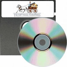 a floppy disk with a picture of a horse drawn carriage on it .