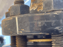 a close up of a bolt with the word boltex 2 on it