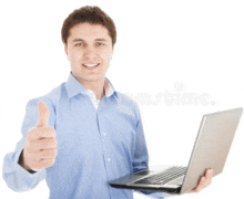 a man in a blue shirt holds a laptop and gives a thumbs up