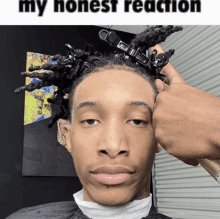 a picture of a man with dreadlocks and the words my honest reaction