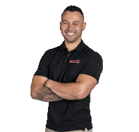 a man wearing a black shirt with a red logo that says armour