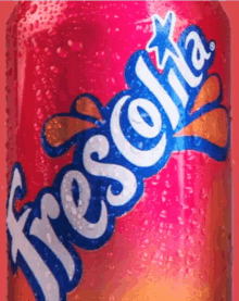 a close up of a can of fresca soda with water drops on it