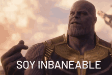 thanos from the movie avengers infinity war is pointing at the camera with the words soy inbaneable below him