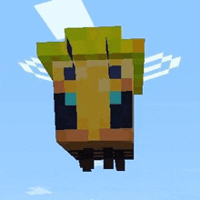 a minecraft bee with wings is flying in the air .