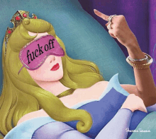 a princess with a sleep mask that says " fuck off " on it