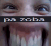 a close up of a person 's face with the words pa zoba on the bottom of it