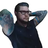 a man with glasses and a tattoo on his arm that says rs