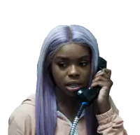 a woman with purple hair talking on a telephone