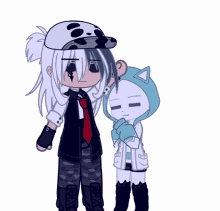 a boy and a girl are standing next to each other and the girl is wearing a cat hoodie