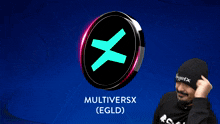 a man is giving a thumbs up in front of a coin that says multiversx