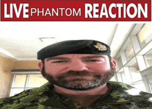 a man in a military uniform stands in front of a sign that reads live phantom reaction