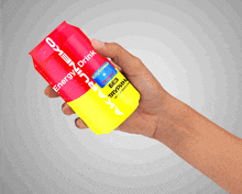 a hand holding a red and yellow energy drink