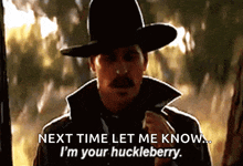 a man in a cowboy hat is saying " next time let me know i 'm your huckleberry "