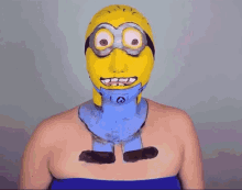 a woman has a minion painted on her face