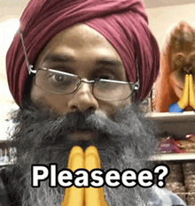 a man with a beard wearing glasses and a turban is asking for pleaseee