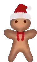 a gingerbread man is wearing a santa hat and scarf .