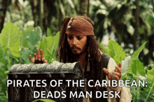 a man in a pirates of the caribbean costume is holding a chest