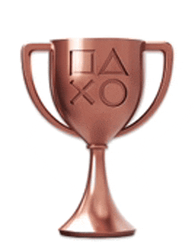 a copper trophy with a square , circle and x on it