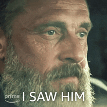 a man with a beard has the words " i saw him " above him